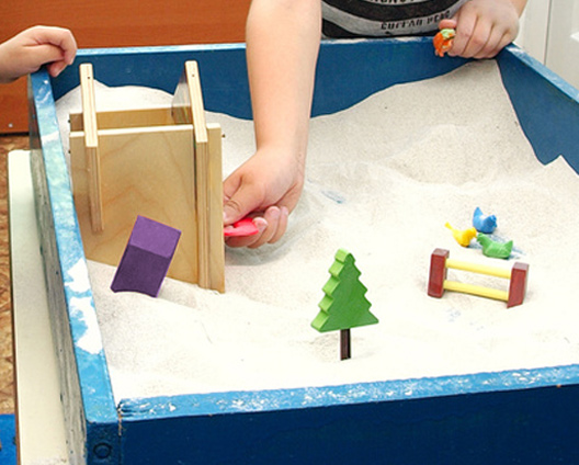 play enactment with sandpit